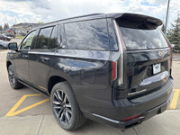 The 2023 Cadillac Escalade Sport Platinum stands out in Galactic Grey Metallic with 22-inch 12-spoke... (image 3)