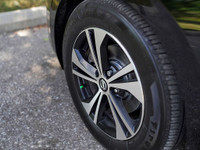 This 2021 Nissan Sentra SV is a stylish and reliable sedan with a sleek black exterior and a comfort... (image 7)