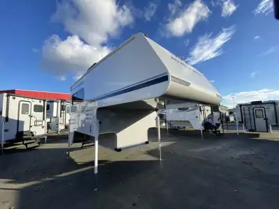 Adventurer Manufacturing Inc. Adventurer 89RB truck camper highlights: Dream Dinette Wet Bath Queen...