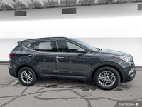 The 2017 Hyundai Santa Fe Platinum in Graphite offers all-wheel drive with a panoramic sunroof, heat... (image 6)