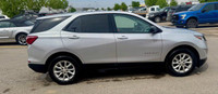 Offering excellent driving manners, this Chevrolet Equinox is SILVER in color and is equipped with a... (image 4)