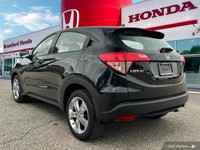 Sleek, black exterior and impressive fuel efficiency—this 2016 Honda HR-V LX is ready for your next... (image 3)