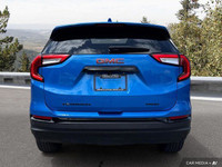 This stunning 2024 GMC Terrain SLE, boasting a sleek Downpour Metallic exterior and a sophisticated... (image 4)