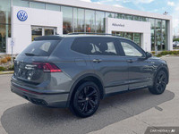 This Volkswagen Tiguan boasts a Intercooled Turbo Regular Unleaded I-4 2.0 L/121 engine powering thi... (image 4)