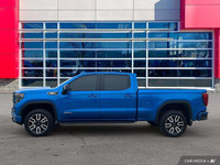 Recent Arrival! Check out this gorgeous Dynamic Blue 2022 GMC Sierra AT4!! This truck is stunning in... (image 1)
