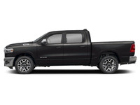 The 2026 Ram 1500 Laramie in a striking black exterior, matched with a robust 4x4 drivetrain, delive... (image 2)
