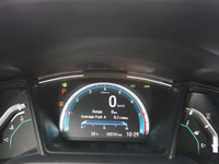 This Aegean Blue Metallic 2021 Honda Civic LX Sedan boasts a sleek profile and impressive fuel effic... (image 8)