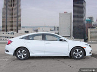 Wheel Covers,Intermittent Wipers,Brake Assist,Daytime Running Lights,Rear Defrost,4-Wheel Disc Brake... (image 6)
