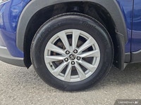 This Corolla features: Brake Assist, ABS, All Wheel Drive, Power Steering, 4-Wheel Disc Brakes, Rear... (image 9)