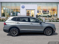 This Volkswagen Tiguan delivers a Intercooled Turbo Regular Unleaded I-4 2.0 L/121 engine powering t... (image 5)