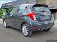 This 2021 Chevrolet Spark 1LT Hatchback offers surprising practicality in a compact package. Its pep... (image 2)