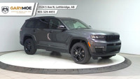 The 2025 Jeep Grand Cherokee L Limited 4x4, in a sophisticated gray, is designed to offer a commandi... (image 6)