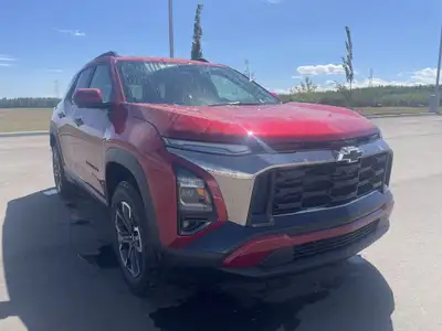 The 2025 Chevrolet Equinox ACTIV, dressed in a bold Radiant Red exterior with a distinctive Maple Su...