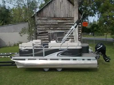 Available now at John's Marina! 2013 Apex Qwest Edge 7516 pontoon. This boat comes with a 30 HP Merc...