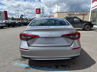 The 2022 Honda Civic Sedan Touring combines sleek styling, advanced technology, and impressive perfo... (image 4)