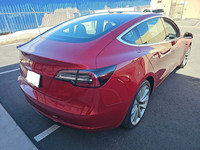 This stunning TESLA MODEL 3 with RED MULTI-COAT and black interior is complimented with upgraded ALL... (image 3)