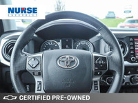 From work to weekends, this PREVIOUS DAILY RENTAL, Black 2023 Toyota Tacoma muscles through any terr... (image 9)