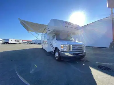 Thor Motor Coach Four Winds Class C gas motorhome 31EV highlights: Full-Wall Slide Bunk Beds Cab Ove...