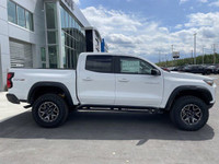The 2025 Chevrolet Colorado ZR2, presented in Summit White with a Jet Black/Artemis interior, is eng... (image 9)