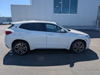 The 2022 BMW X2 xDrive28i is a subcompact luxury SUV that distinguishes itself with a sporty, coupe-... (image 8)