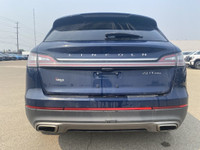 Under the glistening Rhapsody Blue exterior, the 2019 Lincoln Nautilus Reserve stands as a testament... (image 5)