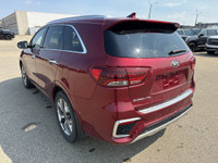 This 2019 Kia Sorento is finished in striking Passion Red Metallic with a refined Black interior, of... (image 5)