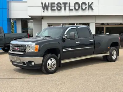 Luxury meets heavy-duty performance in this pre-owned 2011 GMC Sierra 3500HD Denali Dually. With unm...