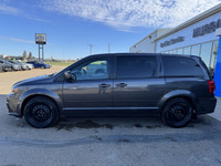 A get-it-done machine, our 2017 Dodge Grand Caravan Canada Value Package Minivan displayed in Granit... (image 1)