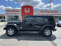 Conquer any terrain with this 2018 Jeep Wrangler Unlimited Sport, a black beauty boasting a powerful... (image 7)