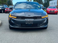 This 2021 Kia K5 GT-Line has a Grey Exterior and Black Interior with seating for 5. Equipped with a... (image 9)