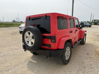 This well above average condition Jeep Wrangler Unlimited Sahara 4WD includes a 3.6L V6, heated leat... (image 3)