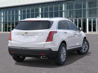 The 2025 Cadillac XT5 Luxury makes a striking entrance finished in Crystal White Tricoat with bold c... (image 7)