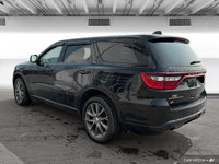 The 2018 Dodge Durango offers leather-faced bucket seats, heated front and rear seats, a heated stee... (image 3)