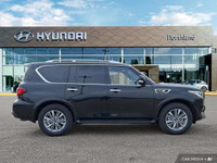 Command the road with this luxurious 2023 INFINITI QX80, boasting a powerful 4WD system and a sleek... (image 5)