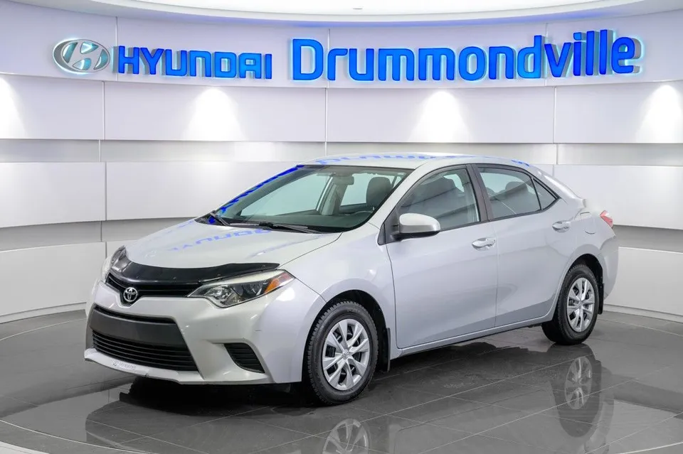 TOYOTA COROLLA CE 2015 + A/C + GROUPE ELECTRIQUE + WOW !!