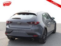 This 2023 Mazda MAZDA3 GT AWD is a sleek and stylish hatchback with a stunning red interior that's s... (image 4)