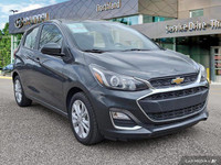 This 2021 Chevrolet Spark 1LT Hatchback offers surprising practicality in a compact package. Its pep... (image 6)