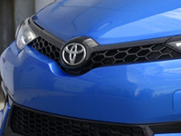 Experience the vibrant blue 2018 Toyota Corolla iM, a front-wheel-drive sedan designed for precision... (image 9)