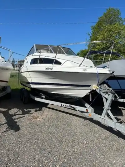 New manifolds, Elbows and oil pan. INCLUDES: Galvanized trailer, bimini, enclosure, mooring cover, V...