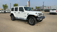 This 2025 JEEP WRANGLER 4-DOOR SAHARA has the following options Cloth Low-Back Bucket Seats, Remote... (image 1)