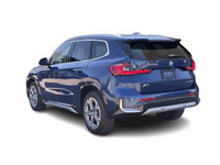 2024 BMW X1 xDrive28i Phytonic Blue Metallic PREMIUM ESSENTIAL PACKAGE Auto Dimming & Folding Mirror... (image 6)