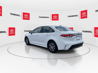 This, is a White 2024 Toyota Corolla Hybrid with LE Package, Featuring:~ No Accidents~ One Previous... (image 6)