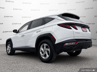 This 2022 Hyundai Tucson Essential SUV boasts a stunning Crystal White exterior and a sleek black cl... (image 3)