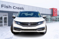 The 2021 Honda Civic EX is a stylish and efficient compact sedan that offers a smooth ride, modern t... (image 1)
