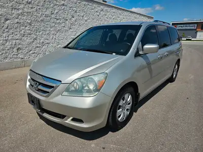 TRADE IN VEHICLE SOLD AS IS 2006 HONDA ODYSSEY EX HAS SOME RUST ON BOTH REAR QUARTER PANEL, FRONT TW...