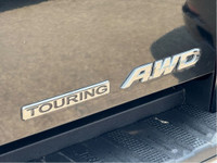 Pristine condition and Fully loaded Honda Ridgeline Touring with LOW KMs! This 4 door All Wheel Driv... (image 4)