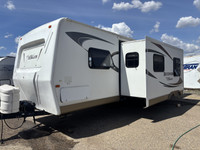 This 2011 travel trailer is waiting to be loved by it's new owners! The rear bathroom in this unit i... (image 2)