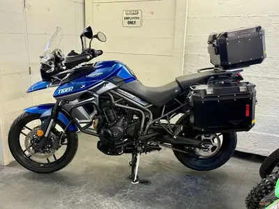 Used 2017 Tiger 800 XRX with 3 piece luggage and engine guards. Comes stock with cruise control. 201...