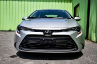 This 2024 Toyota Corolla is for sale today. This low mileage sedan has just 10,822 kms. It's silver... (image 3)