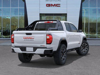 Experience bold refinement and off-road capability with this 2025 GMC Canyon AT4, finished in Summit... (image 7)